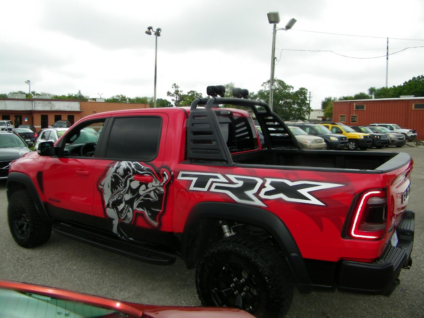 2022 Red /Black RAM 1500 TRX TRX Crew Cab SB 4WD (1C6SRFU90NN) with an 6.2L V8 OHV 16V engine, 8A transmission, located at 4000 Bee Ridge Road, Sarasota, FL, 34233, (941) 926-0300, 27.298664, -82.489151 - Photo#3